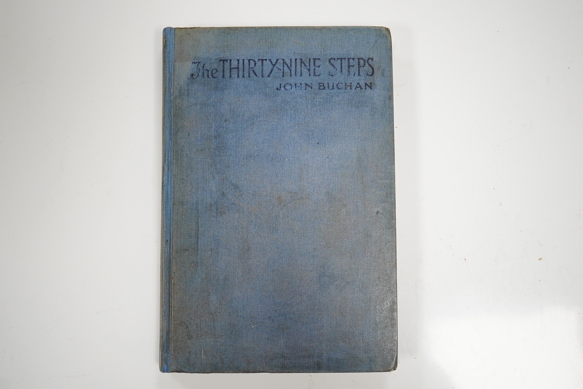 Buchan, John - The Thirty-Nine Steps. 1st Edition. half title and advert. leaf: original blue lettered cloth (rebacked with spine laid-down, though it is completely faded). Edinburgh and London: William Blackwood and Son